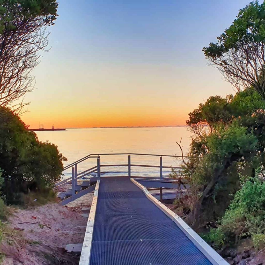 Pathway to sunset over Australian coastal waters.