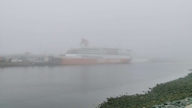 Spirit of Tasmania ferry in foggy port.