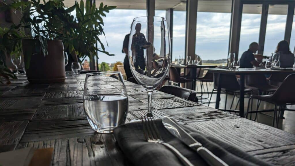 Elegant waterfront dining setup in Australian restaurant.